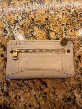 The Sak Beige Leather Wristlet with Gold Accents